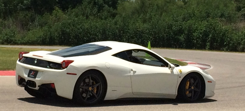 Illustration for article titled Driving A Ferrari 458 On A Race Track Will Leave You Giggling All Day